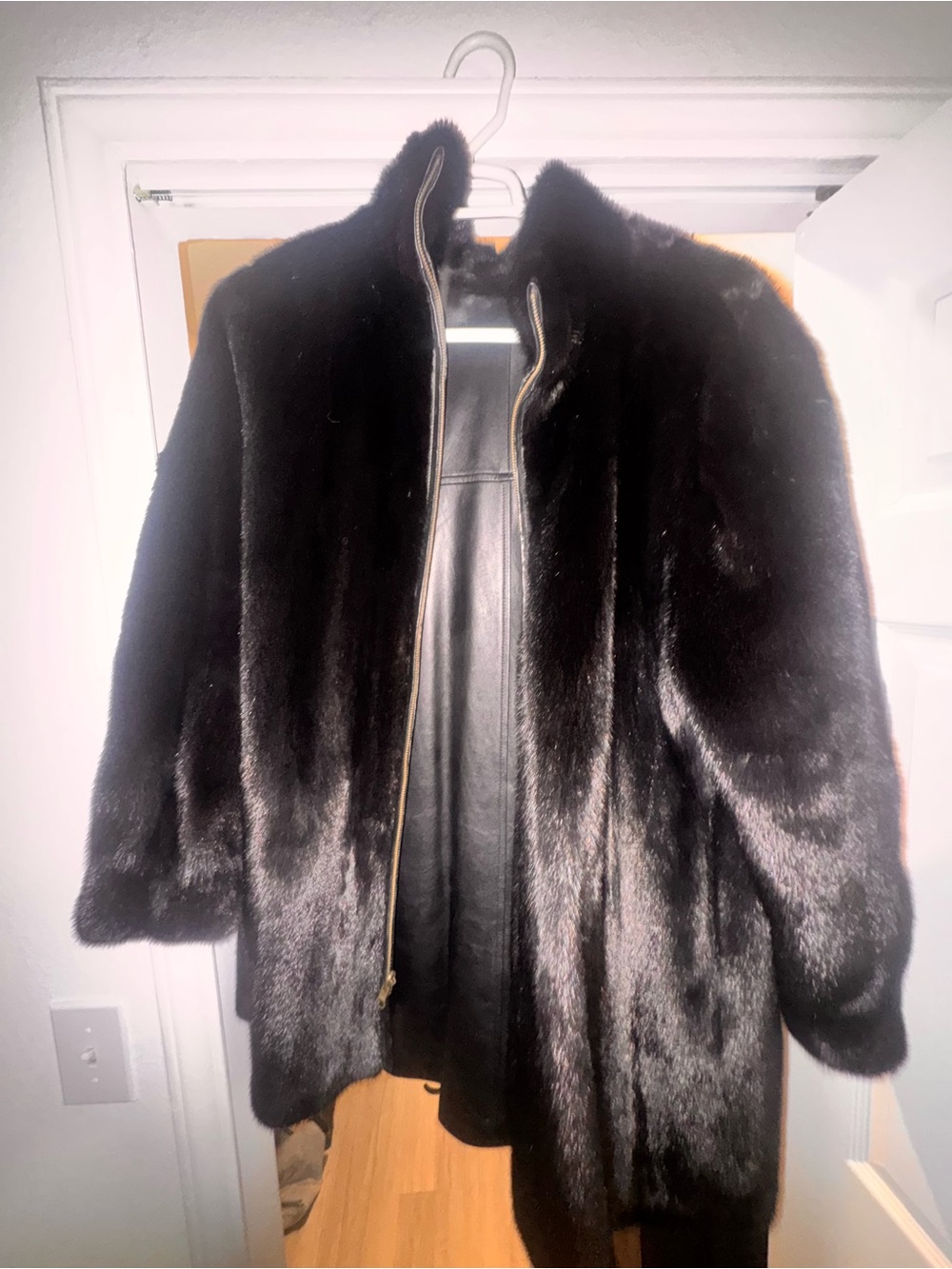 Reversible mink and lambskin fur coat